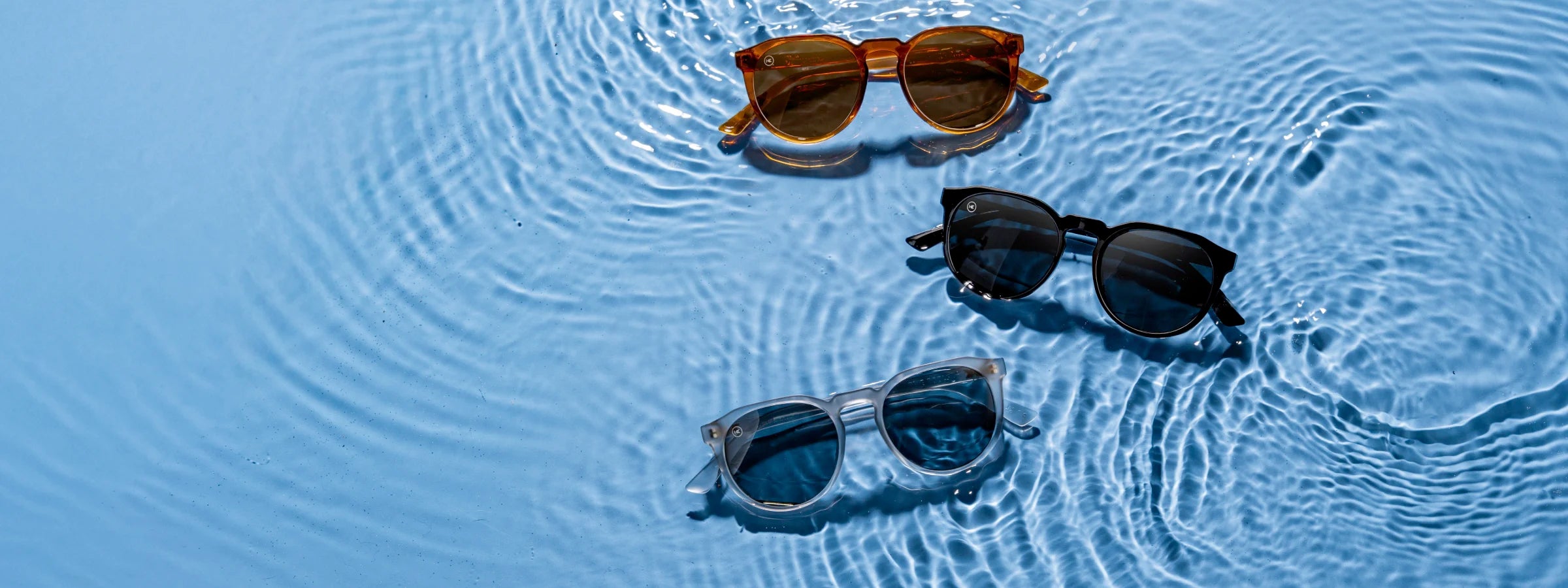 Tide Pools Knockaround Sunglasses. Photographed on water