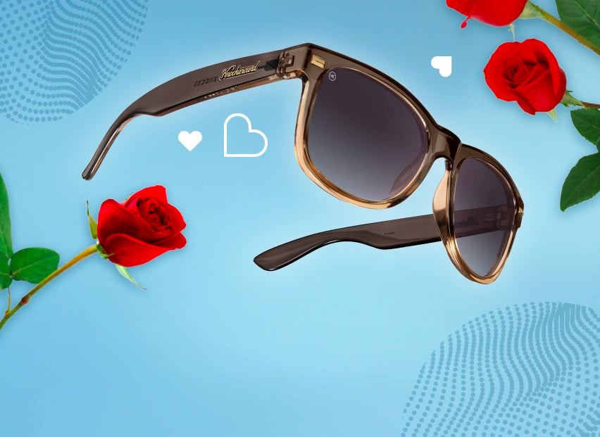 Cortado Fort Knocks sunglasses on a blue background with roses