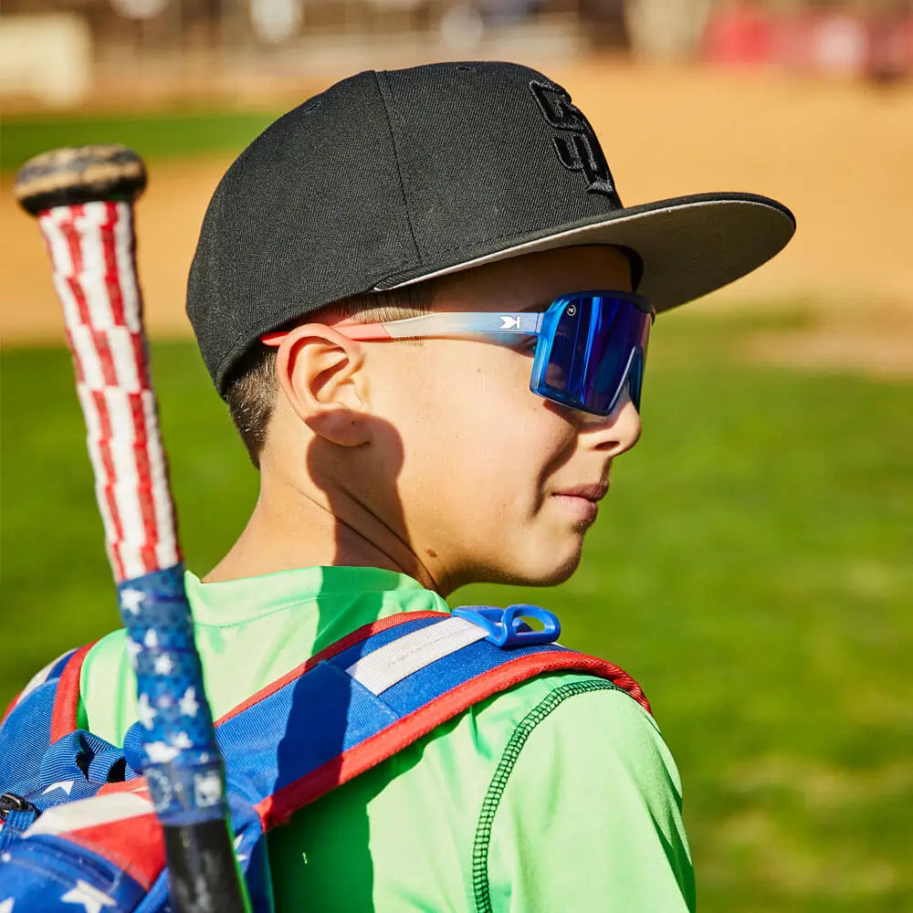 Boy wearing Rocket Pop Kids Campeones Sunglasses
