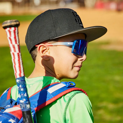 Boy wearing Rocket Pop Kids Campeones Sunglasses
