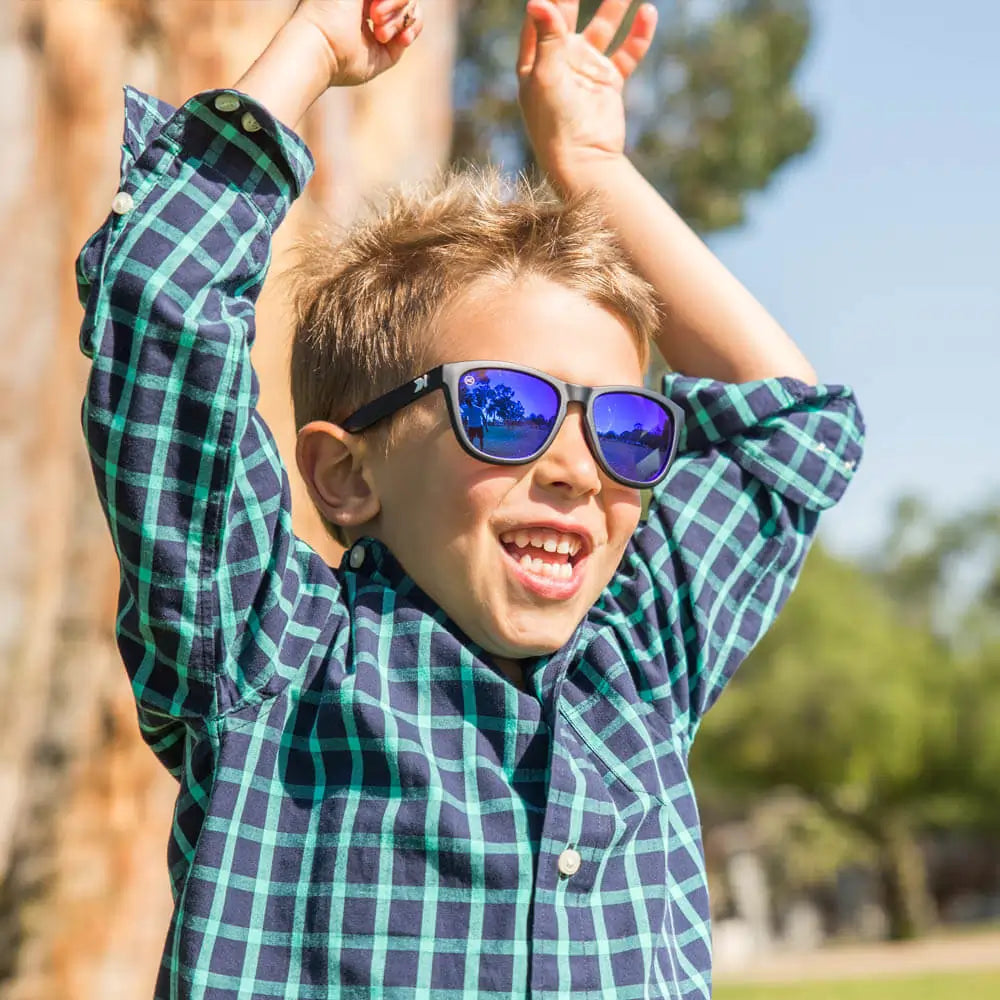 Boy wearing Black / Moonshine Kids Premiums Sunglasses
