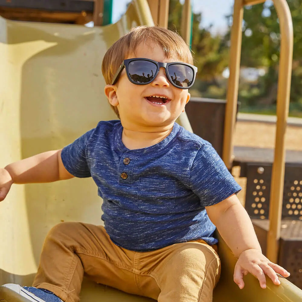 Boy wearing Black on Black Kids Premiums Sunglasses
