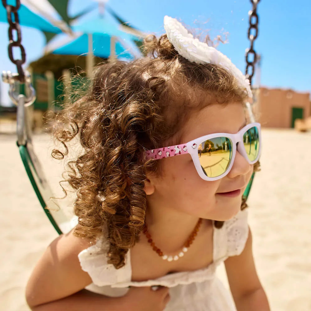 Girl wearing Hello Kitty Kids Premiums Sunglasses