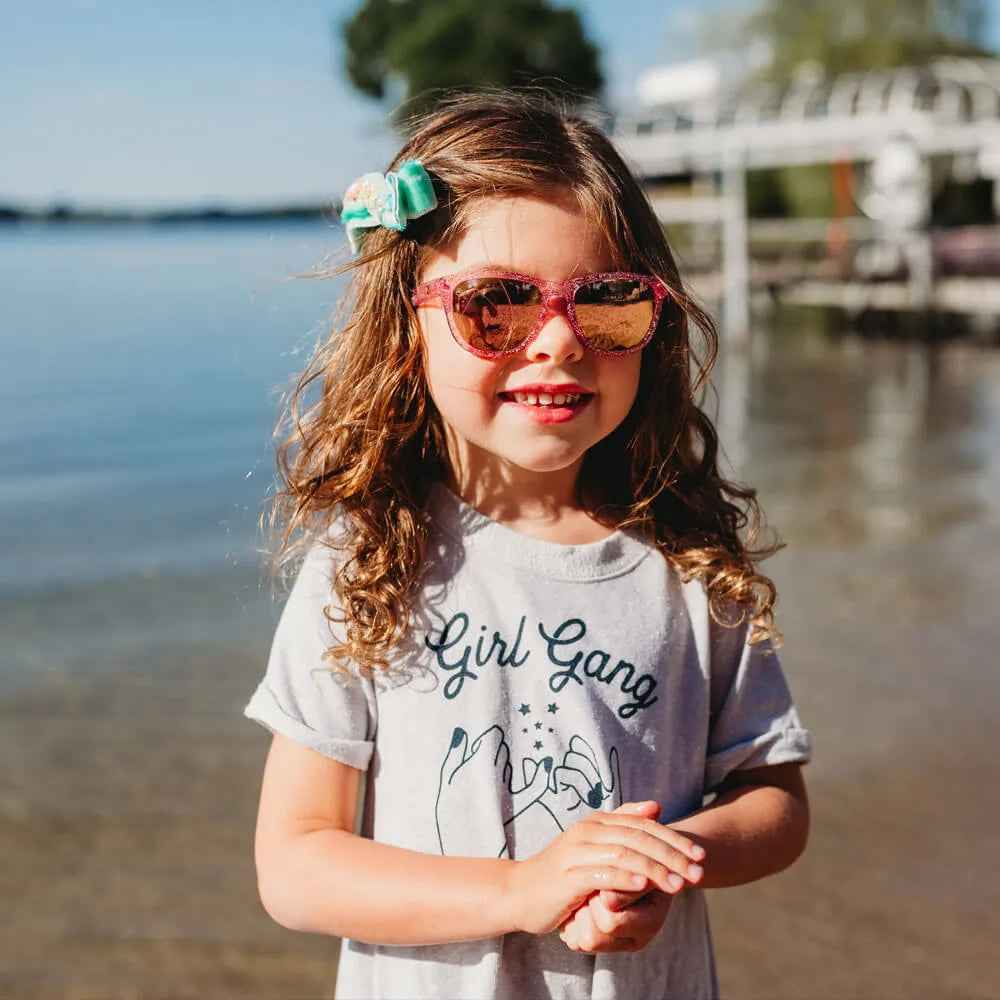 Girl wearing Pink Sparkle Kids Premiums Sunglasses
