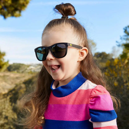 Girl wearing Sk8er Kids Premiums Sunglasses

