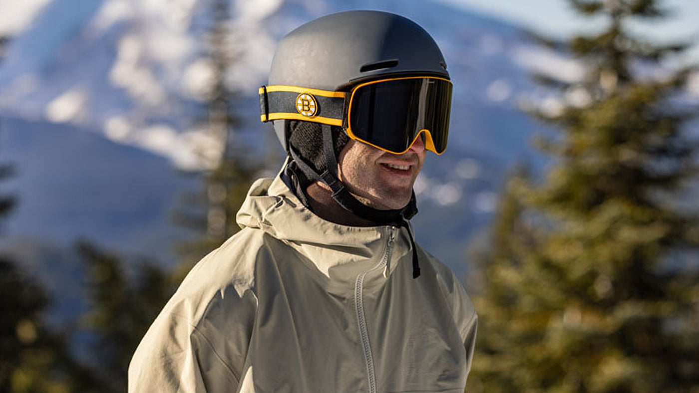 Man wearing Knockaround Boston Bruins Snow Goggles