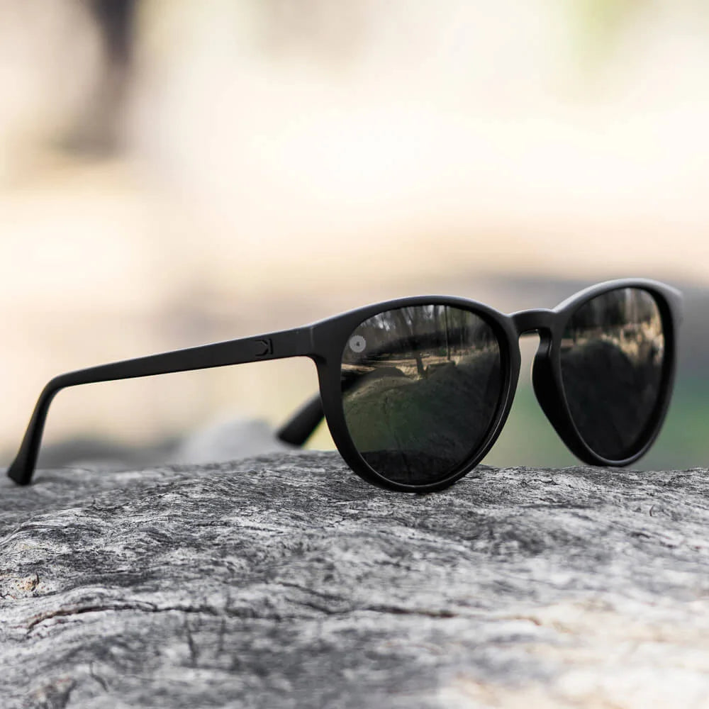 Lifestyle photo of Black on Black Mai Tais Sunglasses
