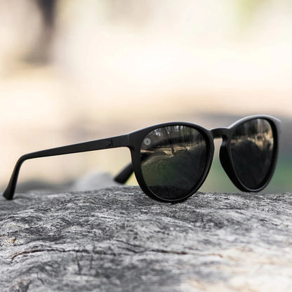 Lifestyle photo of Black on Black Mai Tais Sunglasses
