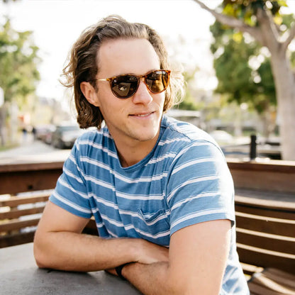 Male wearing Glossy Blonde Tortoise Shell Amber Mary Janes sunglasses