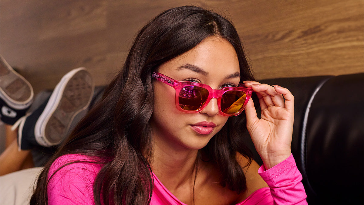 Woman wearing Mean Girls Songbirds sunglasses