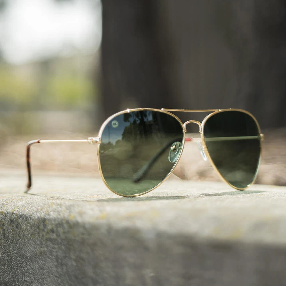 Lifestyle photo of Gold / Aviator Green Mile Highs Sunglasses