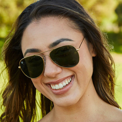 Women wearing Gold / Aviator Green Mile Highs Sunglasses
