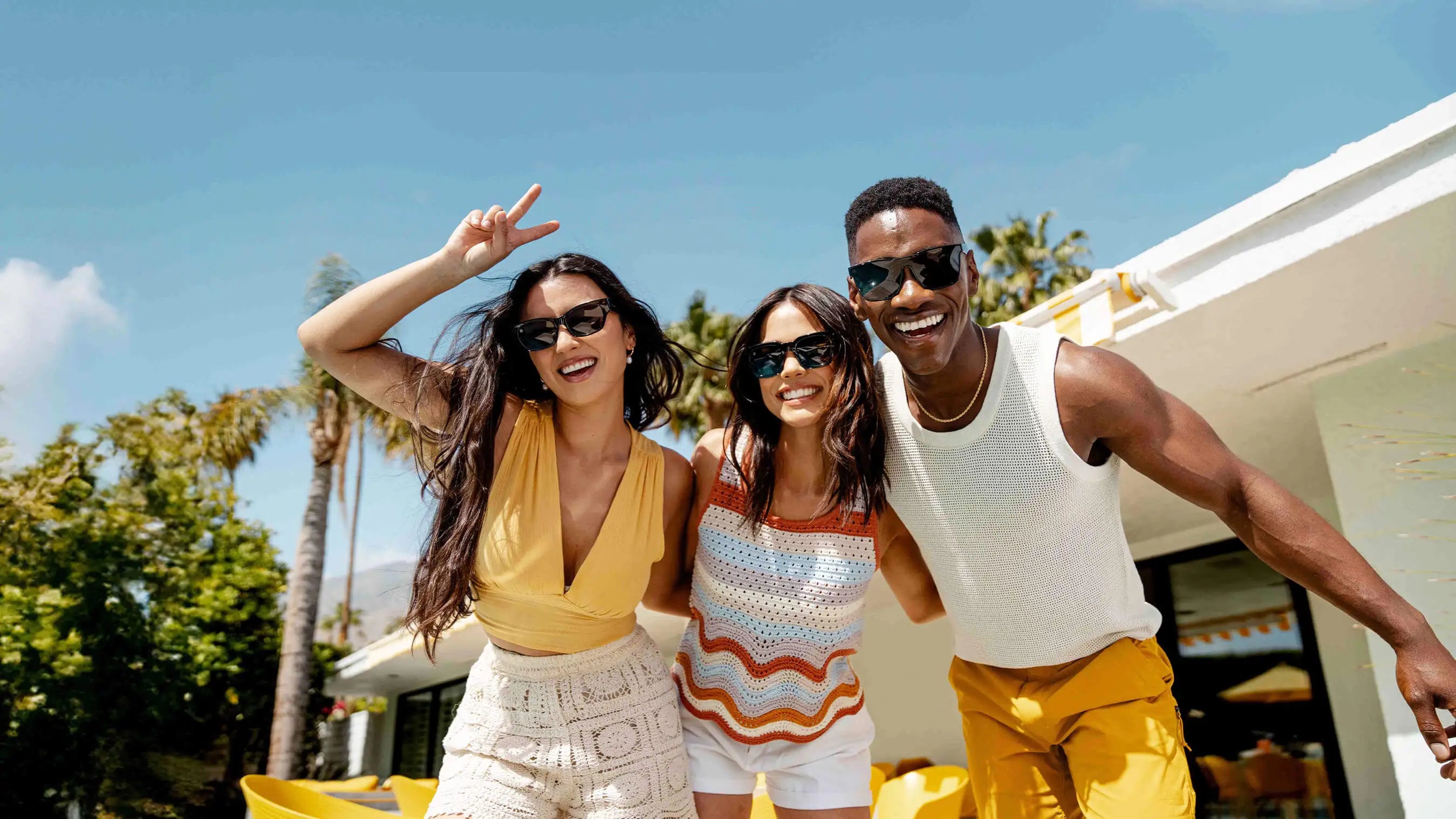 People wearing Knockaround sunglasses smiling