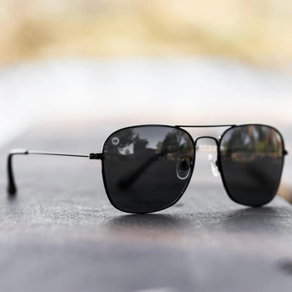 Lifestyle photo of Black / Smoke Mount Evans Sunglasses
