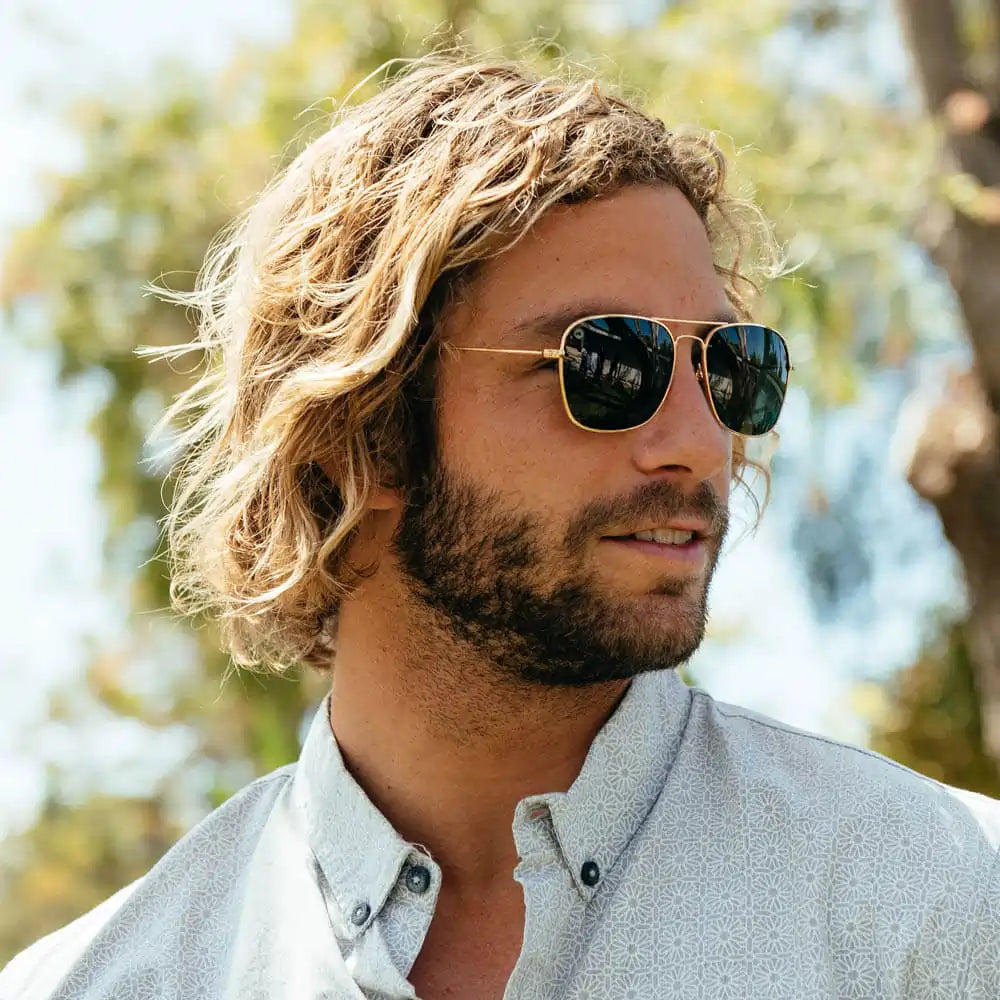 Men wearing Gold / Aviator Green Mount Evans Sunglasses
