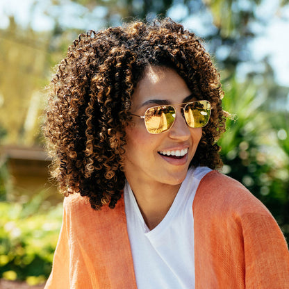 Women wearing Rose Gold / Copper Mount Evans Sunglasses