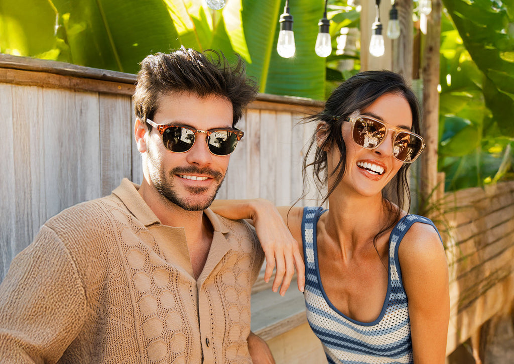 Man wearing Matte Tortoise Shell Brooklines and woman wearing On The Rocks Pacific Palisades