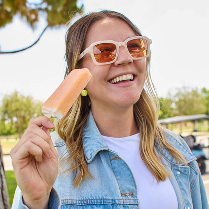 Woman wearing Orange Dreamsicle Panoramas Sunglasses