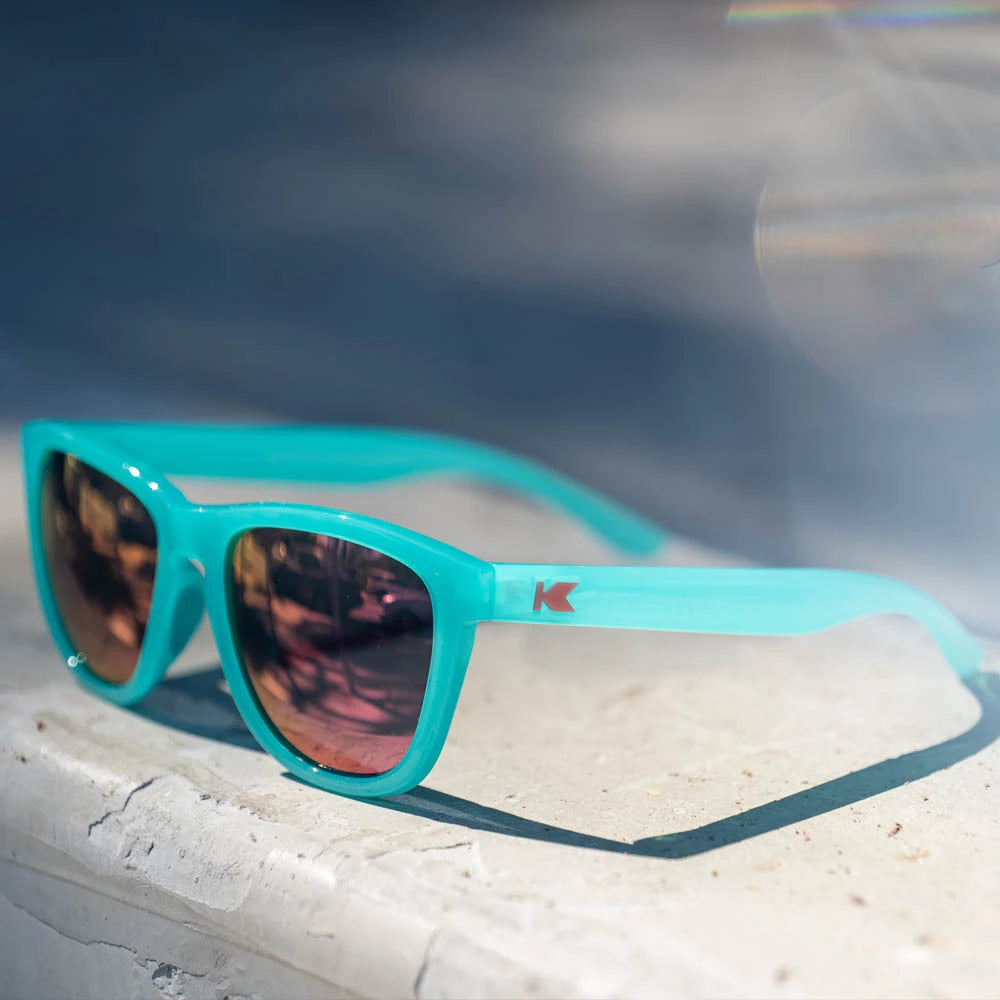 Lifestyle photo of Aquamarine / Fuchsia Premiums Sport Sunglasses
