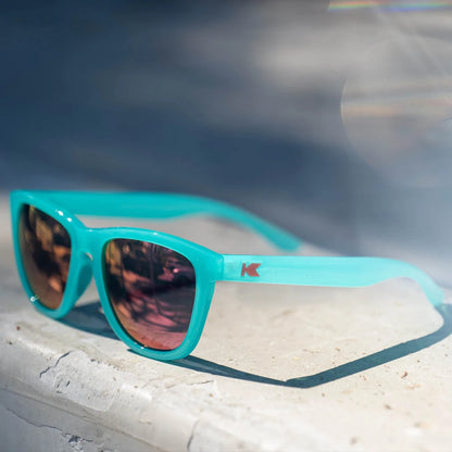 Lifestyle photo of Aquamarine / Fuchsia Premiums Sport Sunglasses
