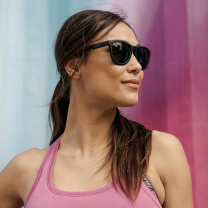 Women wearing Black on Black Premiums Sunglasses

