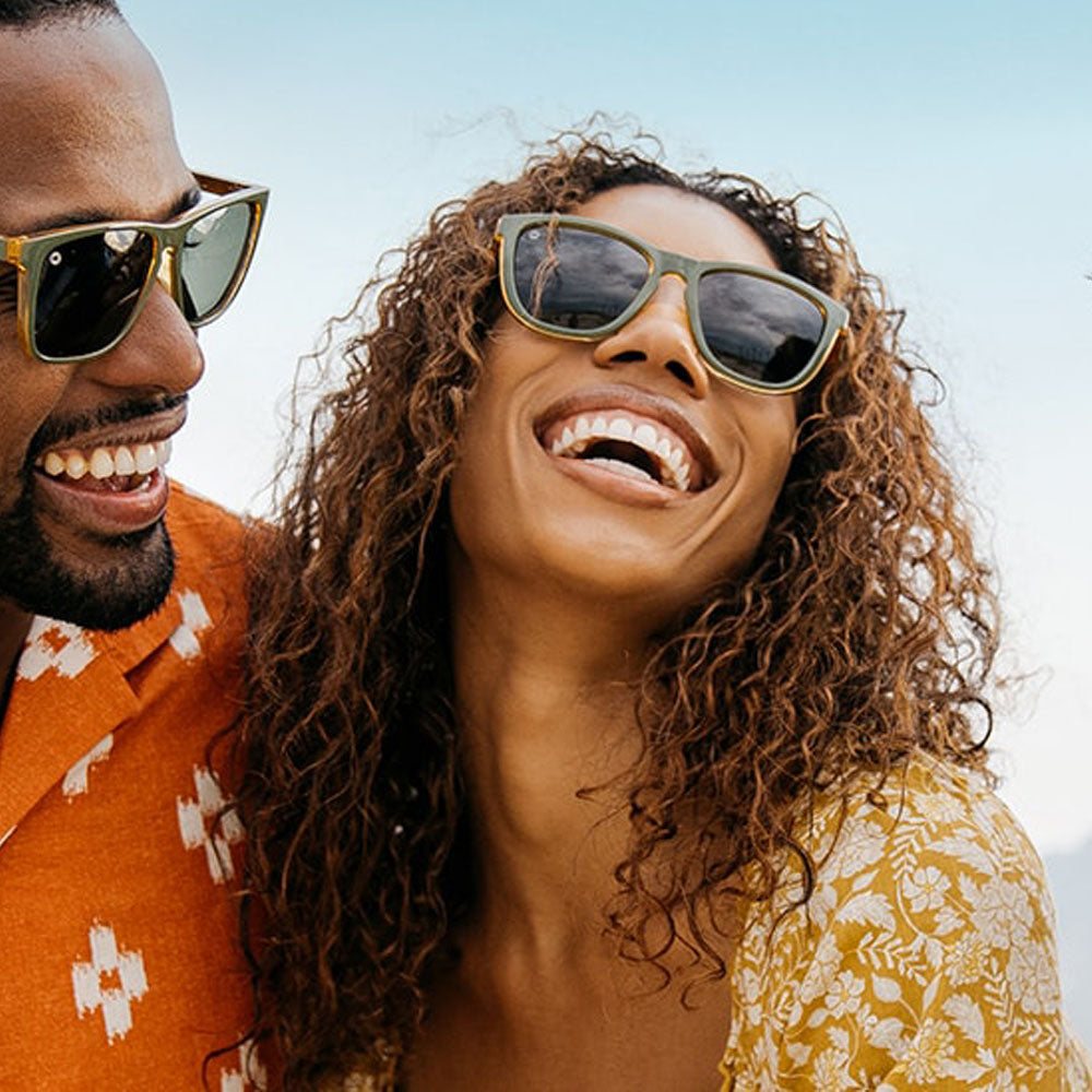 Men and Women wearing Coyote Calls Premiums Sunglasses