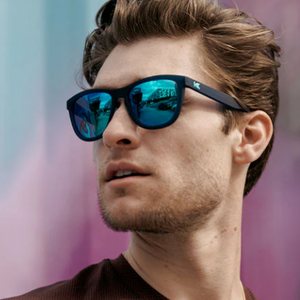 Man wearing Rubberized Navy Mint Premiums Sport sunglasses