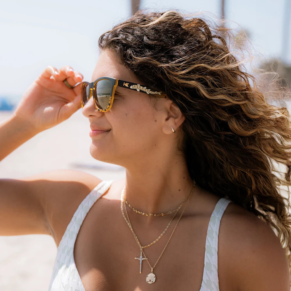 Women wearing Shark Week Premiums 2025 Sunglasses
