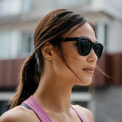 Women wearing Black on Black Premiums Sport Sunglasses
