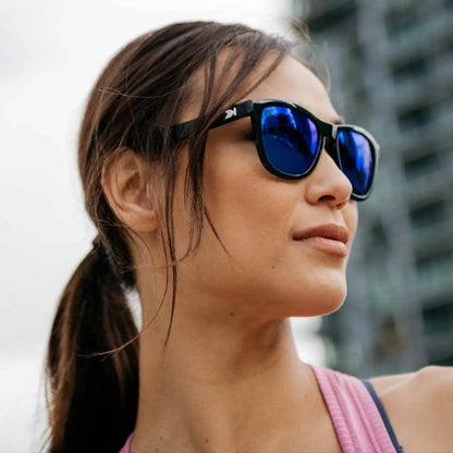 Women wearing Jelly Black / Moonshine Premiums Sport Sunglasses

