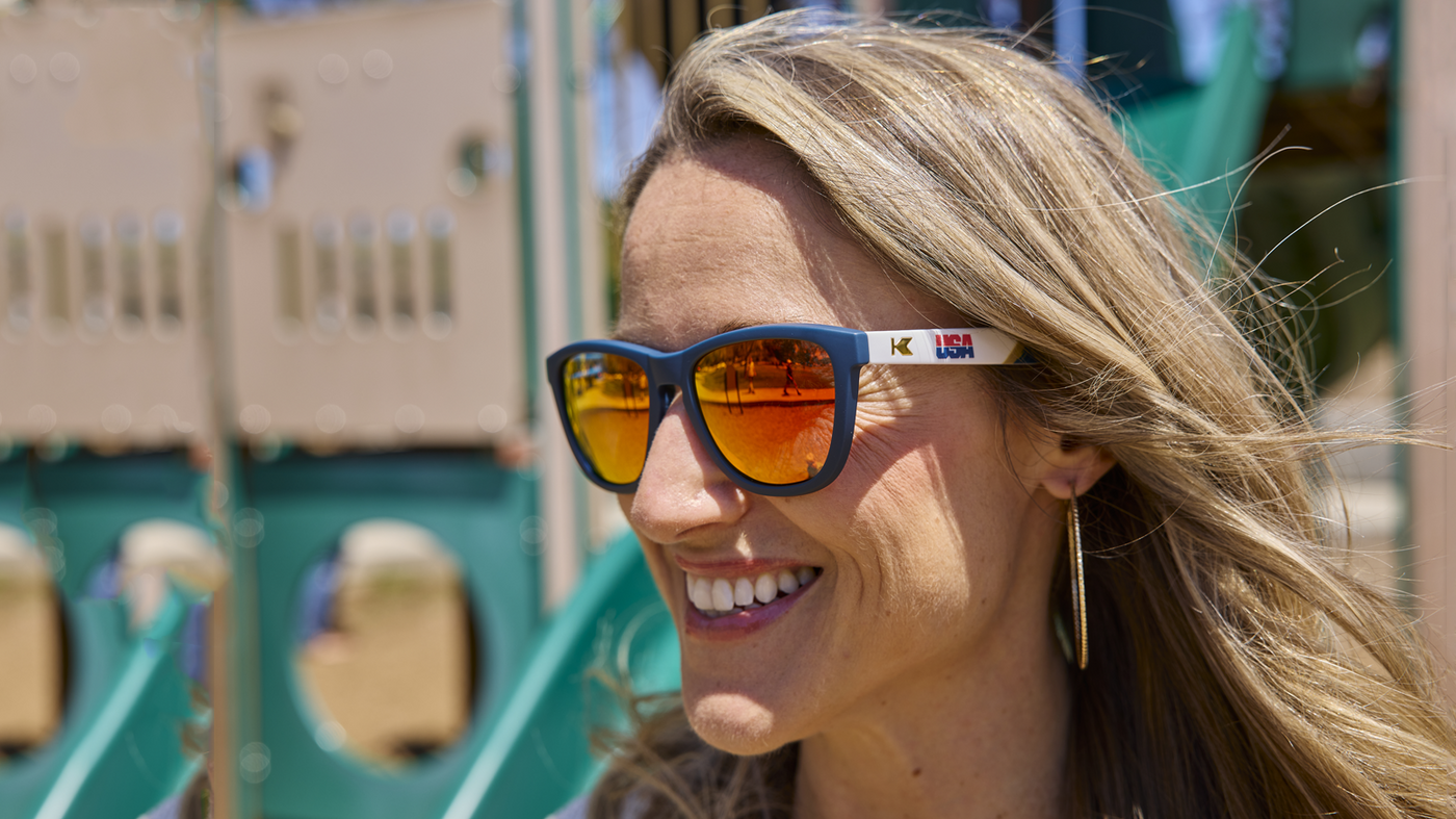 Woman wearing Knockaround and USA Basketball Premiums Sport sunglasses
