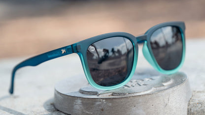 Sunglasses with Deep Blue to Light Blue Frames and Polarized Black Lenses, Lifestyle