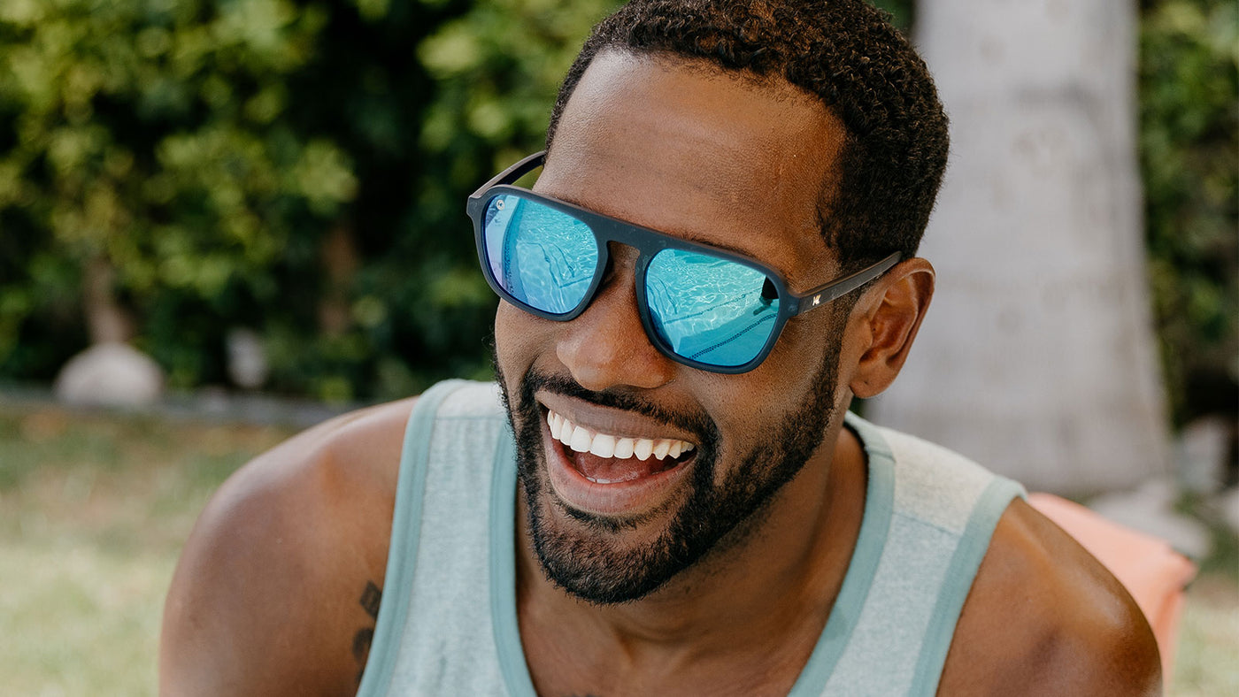 Sunglasses with Blue Frames and Polarized Green Lenses, Male Model