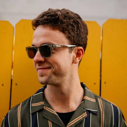Man wearing Aged Sage / Amber Seventy Nines sunglasses