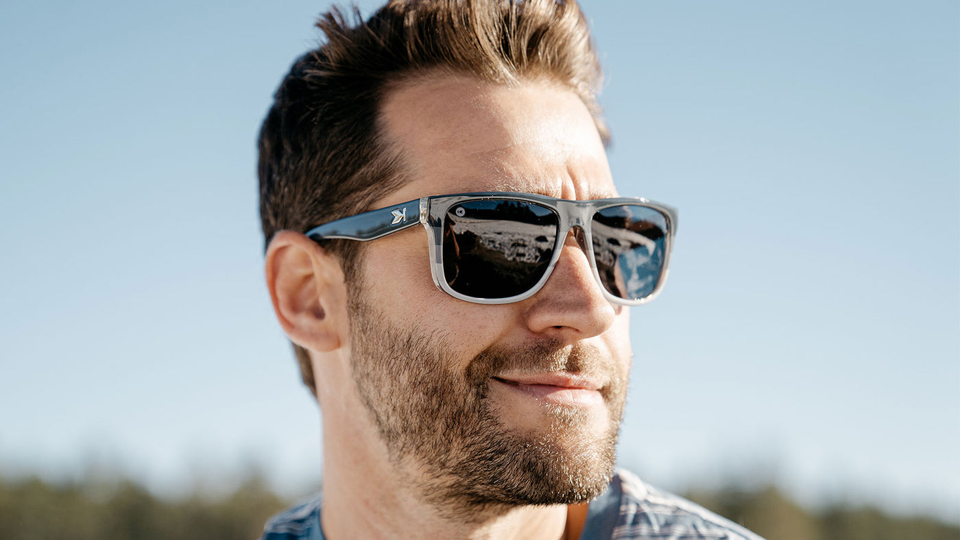 Sunglasses with Smokeset-inspired frames and polarized black smoke lenses, model
