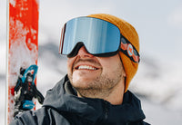 Man wearing Warp Speed Slingshots snow goggles