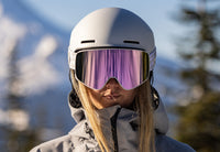 Woman wearing Lilac Powder Slingshots snow goggles