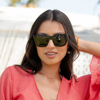 Woman wearing Piano Black Songbirds sunglasses