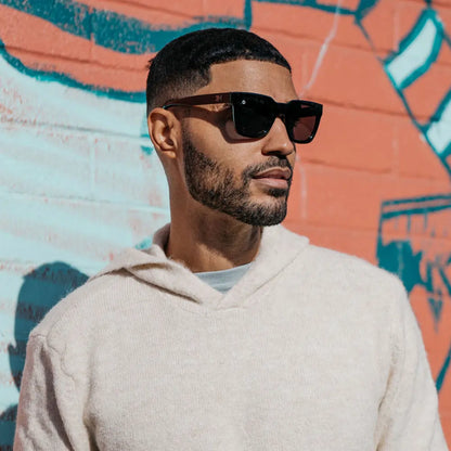 Man wearing Piano Black Songbirds sunglasses
