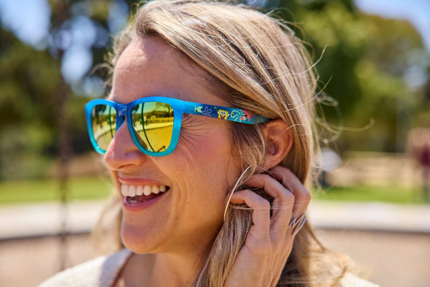 Woman wearing SpongeBob SquarePants Premiums Sunglasses
