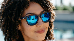 Woman wearing Star Spangled Premiums Sports Sunglasses