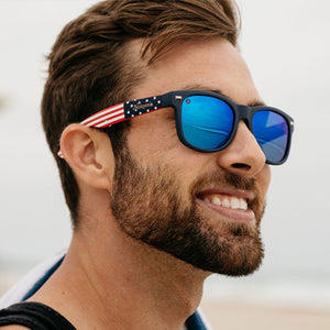 Man wearing Star Spangled Fort Knocks Sunglasses