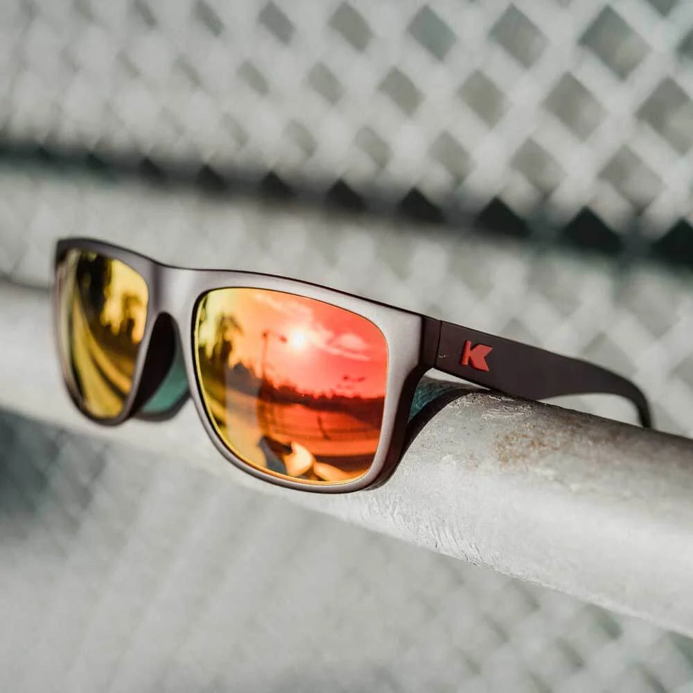 Lifestyle photo of Matte Black / Red Sunset Torrey Pines Sunglasses
