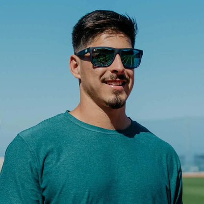 Men wearing Rubberized Navy / Mint Torrey Pines Sport Sunglasses
