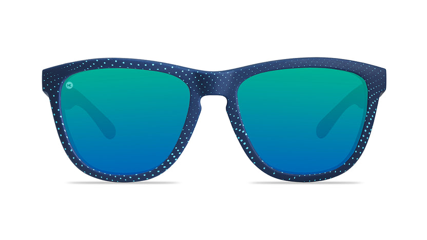 Sunglasses with matte blue frames and polarized green moonshine lenses, front