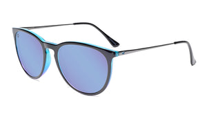 Sunglasses with Glossy Black Exterior and Ice Blue to Lavender Interior and Polarized Snow Opal Lenses. Flyover