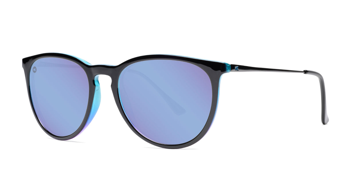 Sunglasses with Glossy Black Exterior and Ice Blue to Lavender Interior and Polarized Snow Opal Lenses. Threequarter