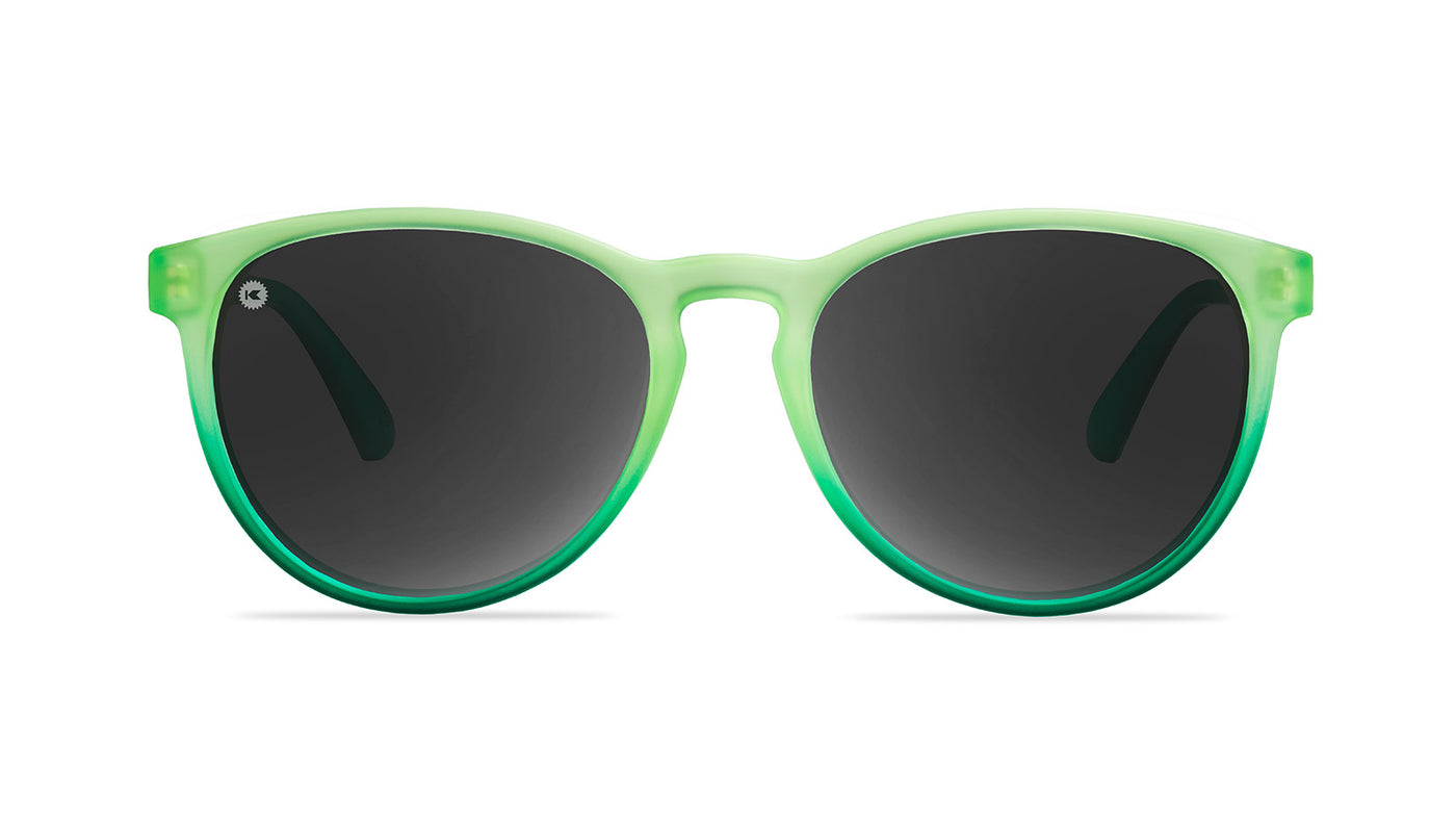 Sunglasses with green fade frames and polarized smoke lenses