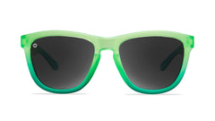Sunglasses with green fade frames and polarized smoke lenses