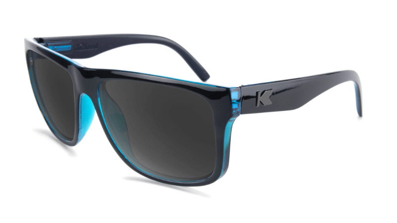 Glossy black sunglasses with blue trim and black lenses